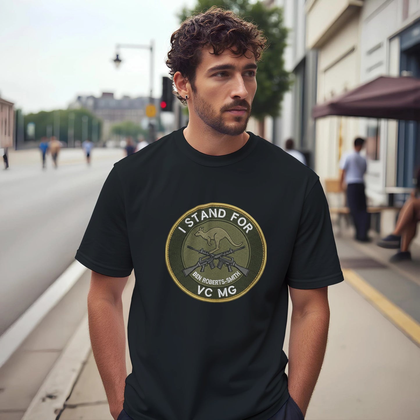 A bloke wears a black 'I Stand For BRS' t-shirt. Unapologetic Australian streetwear and controversial front bar merch by Dog Act Designs.