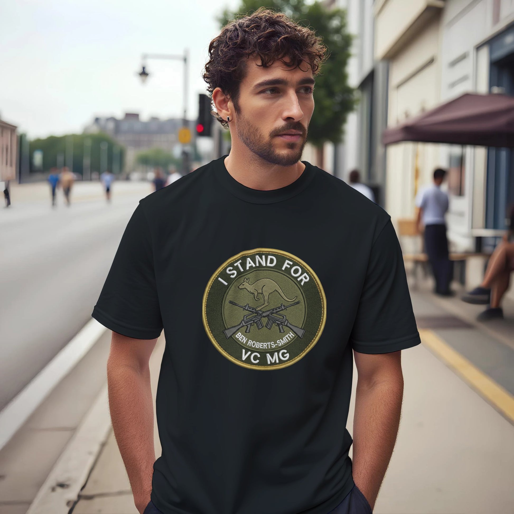 A bloke wears a black 'I Stand For BRS' t-shirt. Unapologetic Australian streetwear and controversial front bar merch by Dog Act Designs.
