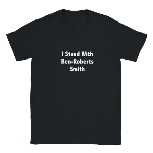 A black t-shirt with bold white text centered on the chest reading 'I Stand With Ben-Roberts Smith'. Rugged, high-impact statement streetwear by Dog Act Designs.